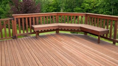 Photo of Is it better to stain or seal my wood deck?